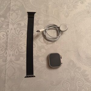 Apple Smartwatch with Black Strap and Silver Frame